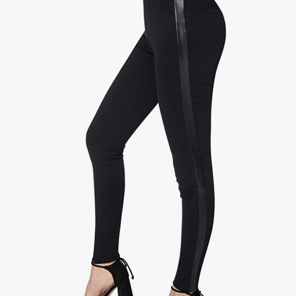 Black leggings with leather tuxedo detailing at sides